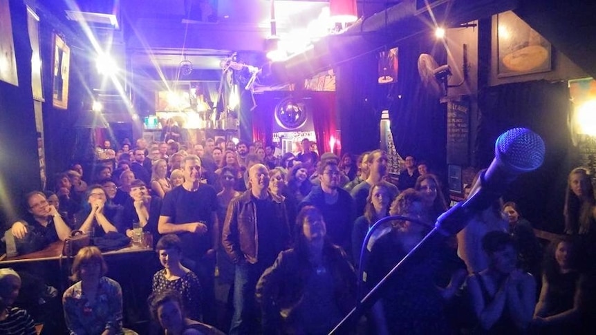 The smaller Phoenix pub venue in Canberra packed during a live music gig.