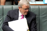 Foreign Minister Kevin Rudd listens during Question Time.