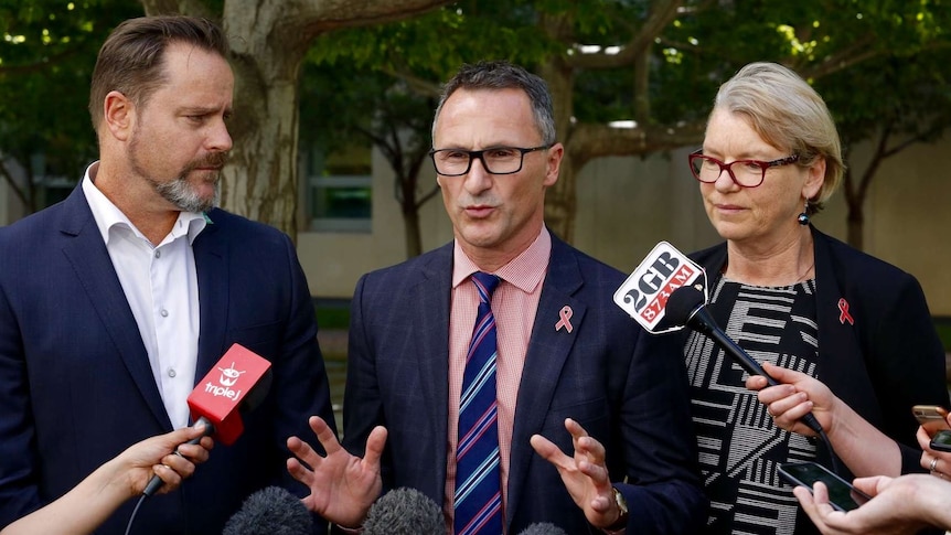 Greens leader Richard Di Natale with senators Janet Rice and Peter Whish-Wilson at a press conference in Canberra.