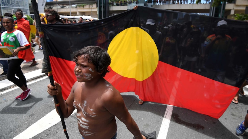 A young Indigenous boy during Invasion Day event