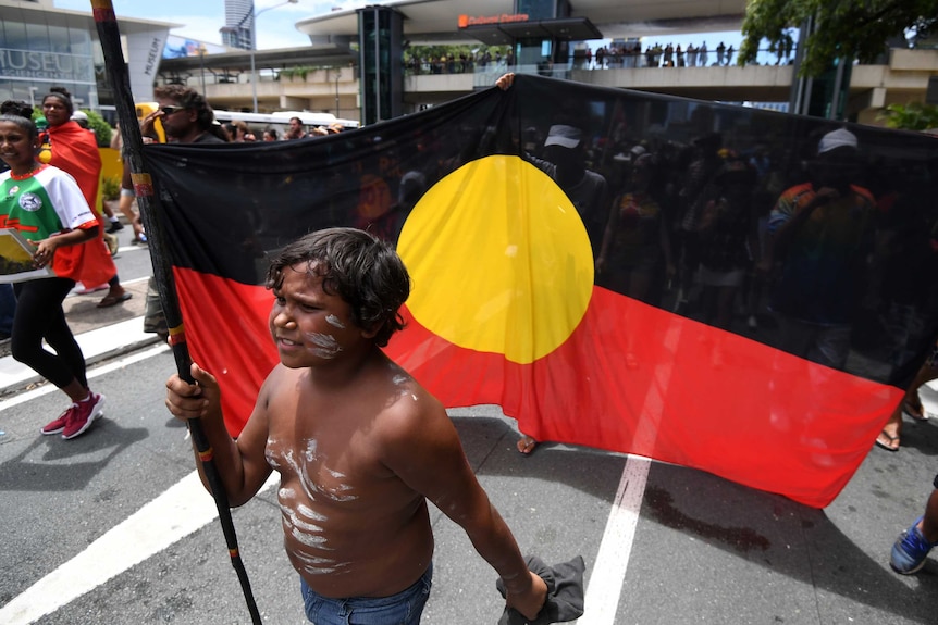 A young Indigenous boy during Invasion Day event