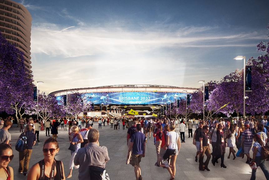 L'extérieur du stade Gabba avec des foules qui vont et viennent. 