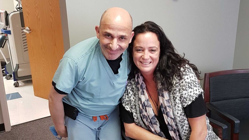 Dr Dionysios Veronikis and Justine Watson pose for a photo after her surgery
