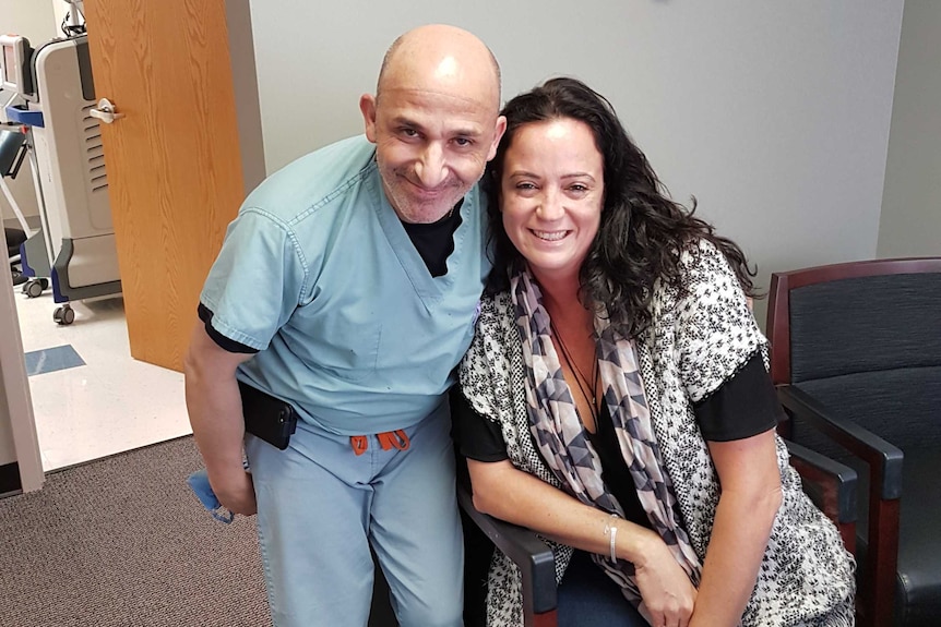 Dr Dionysios Veronikis and Justine Watson pose for a photo after her surgery