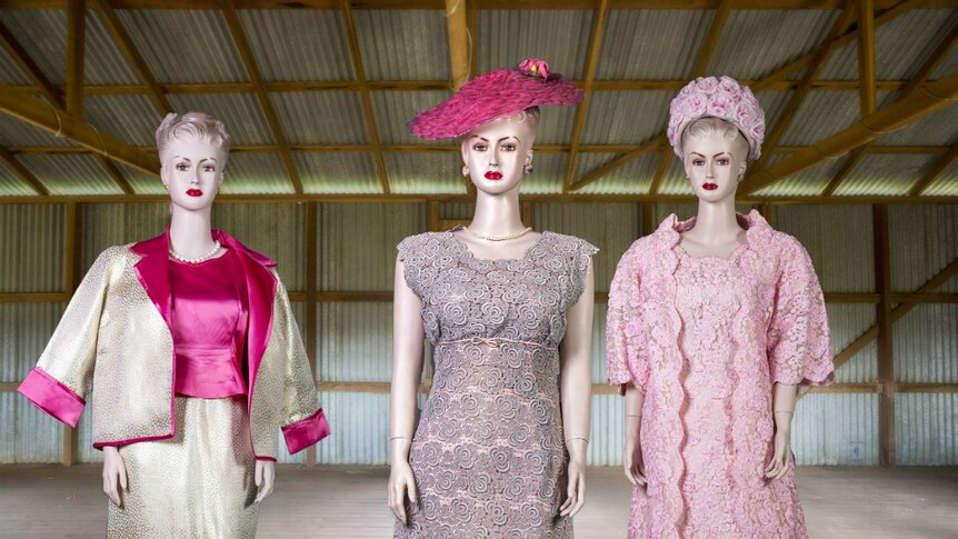 Dulcie Mason's dresses on three mannequins.