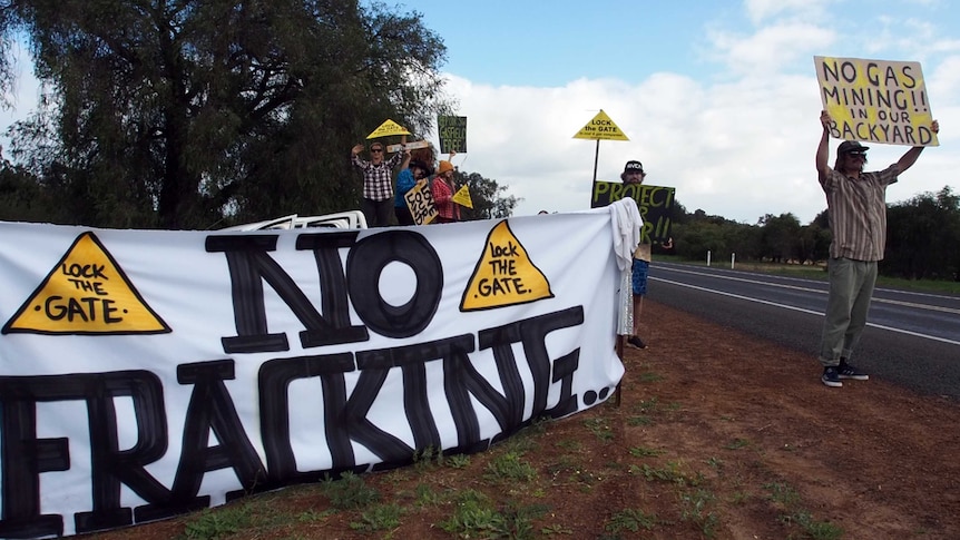 Locals protest fracking at a roadside protest in south west WA.