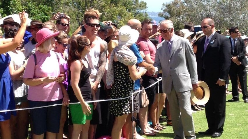 Prince Charles greets members of the public in bright sunshine at Kings Park