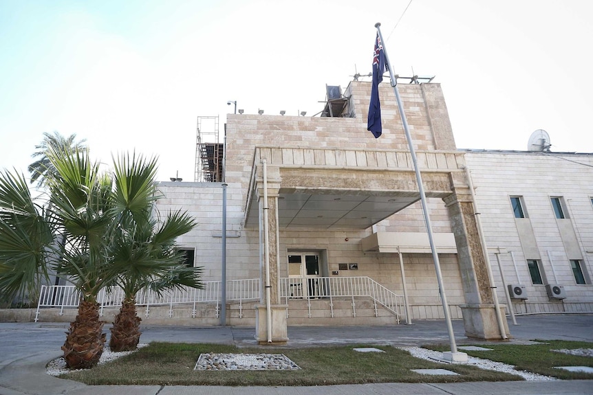 The man was providing security services at the Australian embassy in Baghdad.