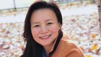 Cheng Lei smiles in a photo from before her arrest