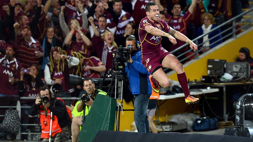 Darius Boyd scores a try during State of Origin II.