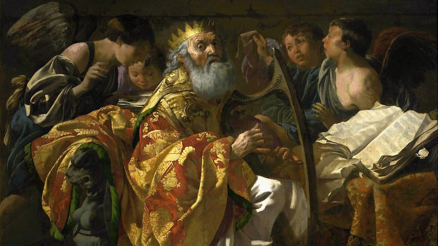 King David playing the harp, surrounded by four angels