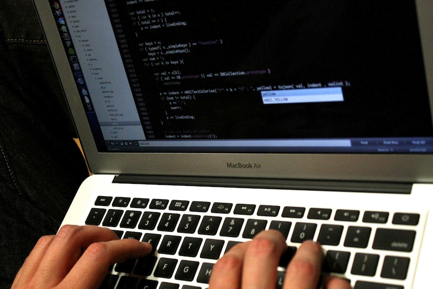 A student working on a laptop