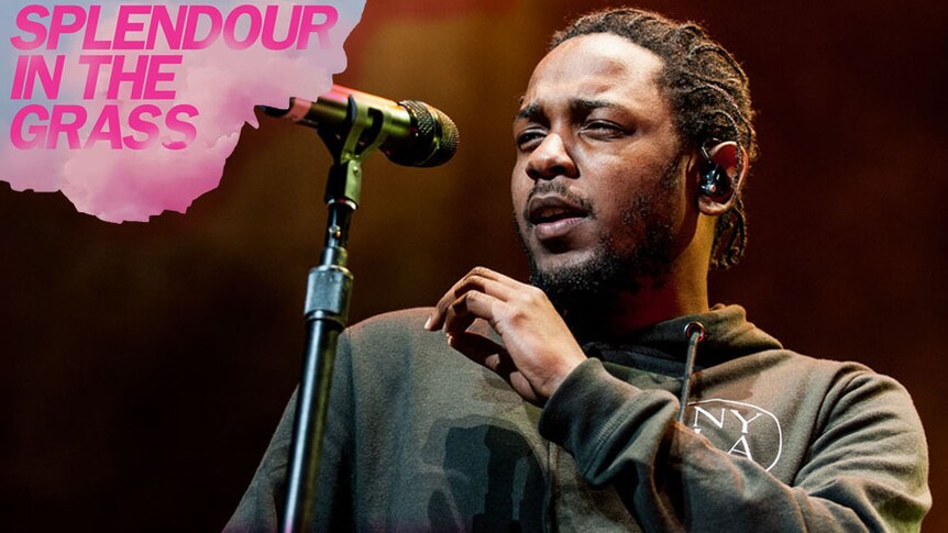 A shot of Kendrick Lamar performing live at Melbourne's Rod Laver Arena 2016 with Splendour In The Grass floating top-left