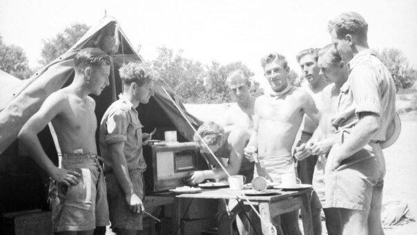 Australian airmen in Corsica listen to news of D-Day