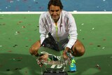 Roger Federer celebrates his seventh Dubai Open title