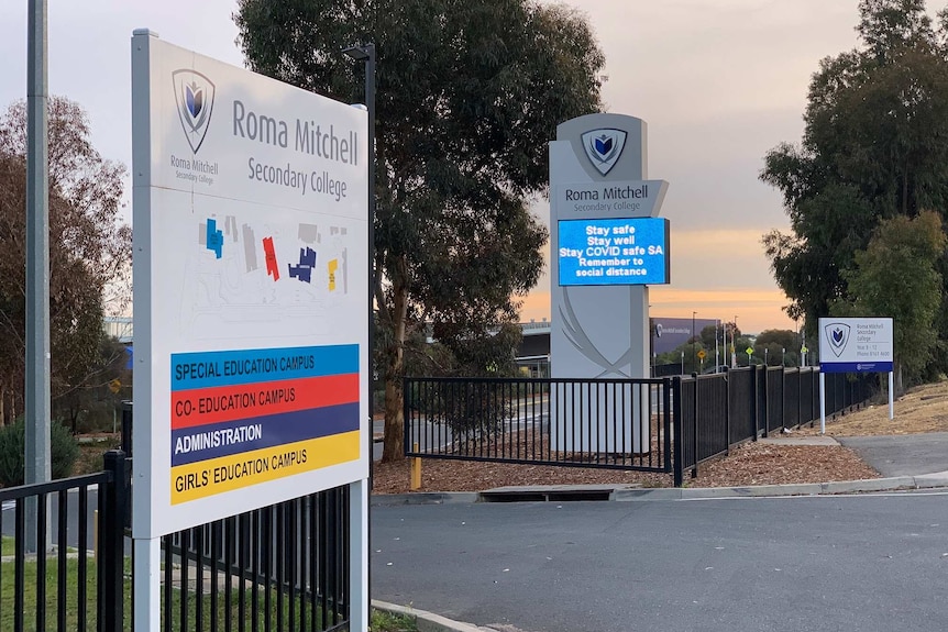 Signs at the entrance of a school