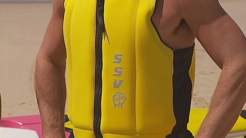 Surf lifesaver competitive safety vest, North Kirra Beach