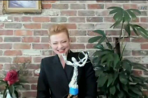 Australian actress Sarah Snook holds a paper Emmy award during the broadcast of the 2020 ceremony.