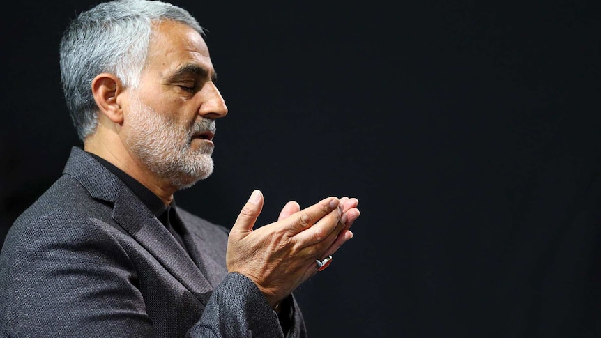 In this file photo from March 27, 2015, commander of Iran's Quds Force, Qassem Soleimani prays at a mosque.
