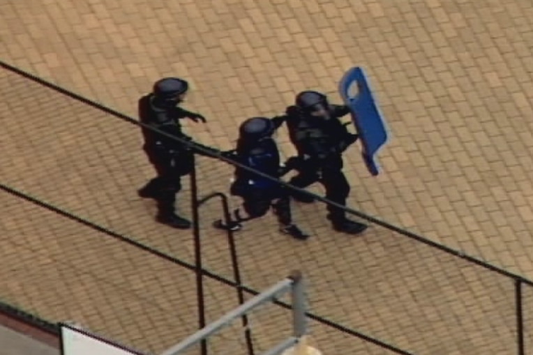 Police during a riot at Parkville youth detention centre, November 2016