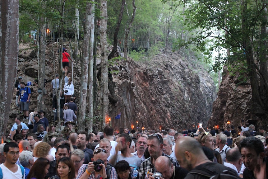 Crowds climb sections of Hellfire Pass in Thailand on Anzac Day 2014.