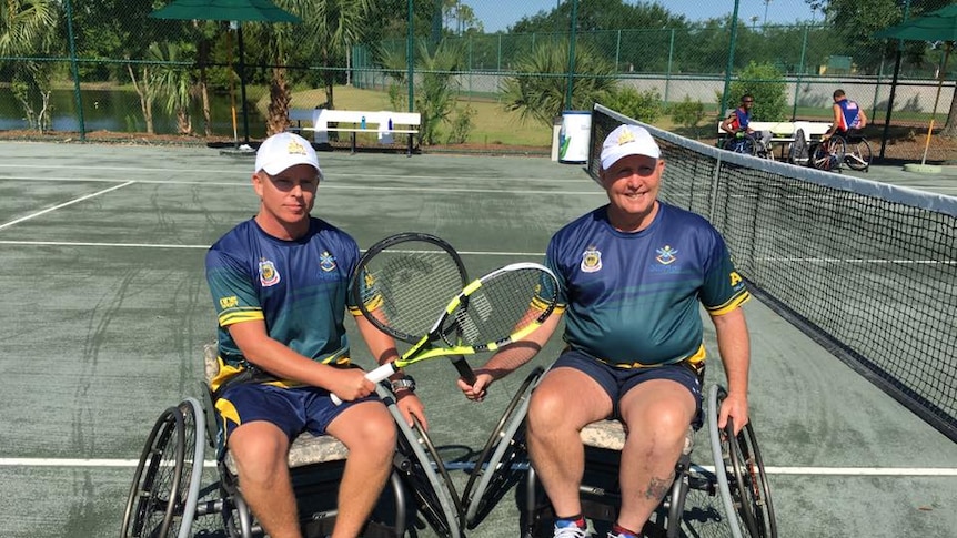 Chris McLeod and Sean Lawler in wheelchairs on the court at Invictus Games