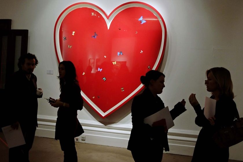 Art enthusiasts gather in front of 'All you need is love' (Leon Neal: AFP)