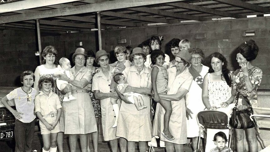 Volunteers at Darwin Hospital care for babies being evacuated after Cyclone Tracy