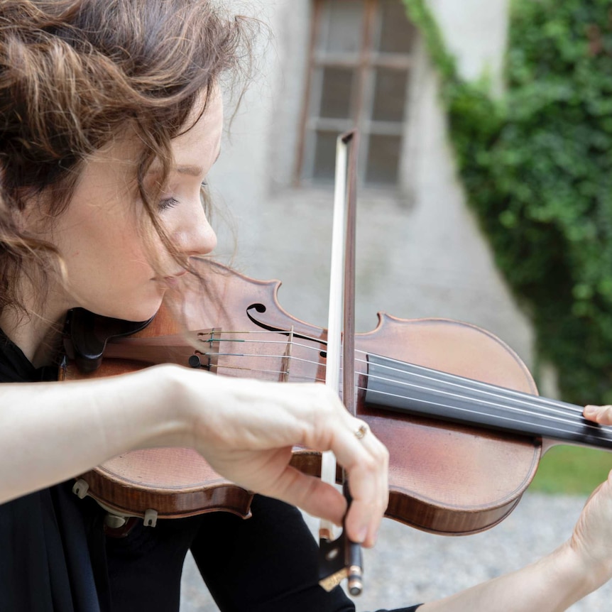 Violinist Hilary Hahn with her violin