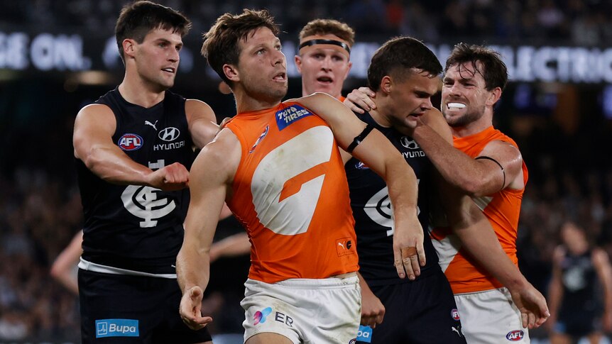 Toby Greene in a scuffle with Carlton players