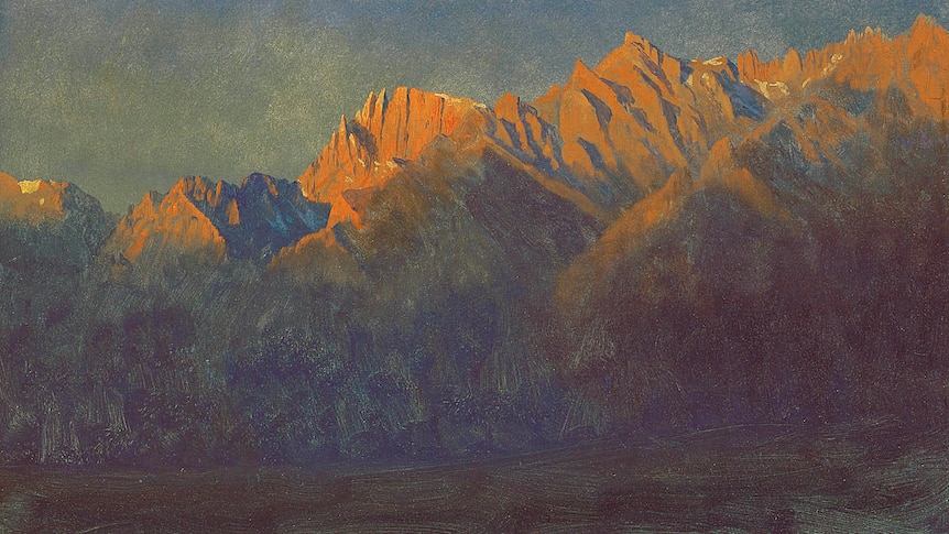 First rays of sunrise on the mountain