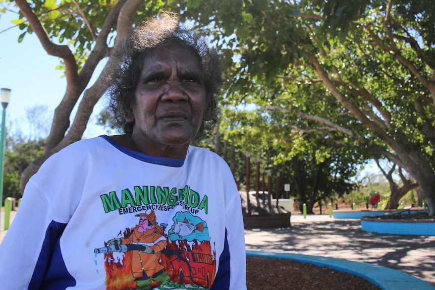 Judith Ganalbarr sits in a Darwin park.