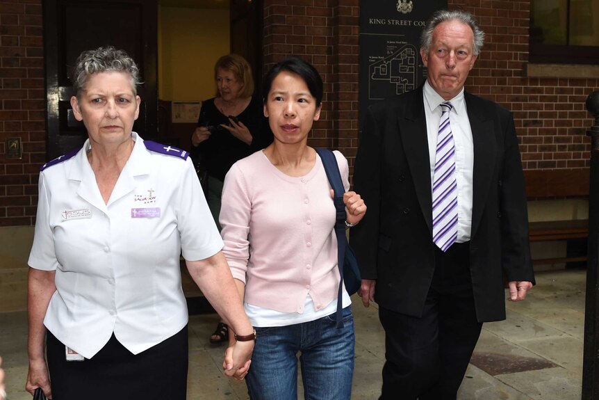Robert Xie's wife Kathy Lin leaves the NSW Supreme Court after her husband was granted bail