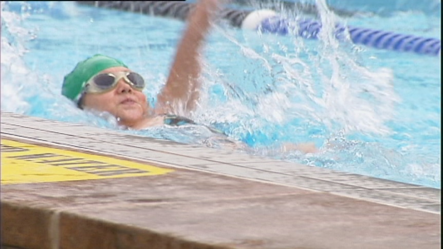 School student competing in swimming carnival