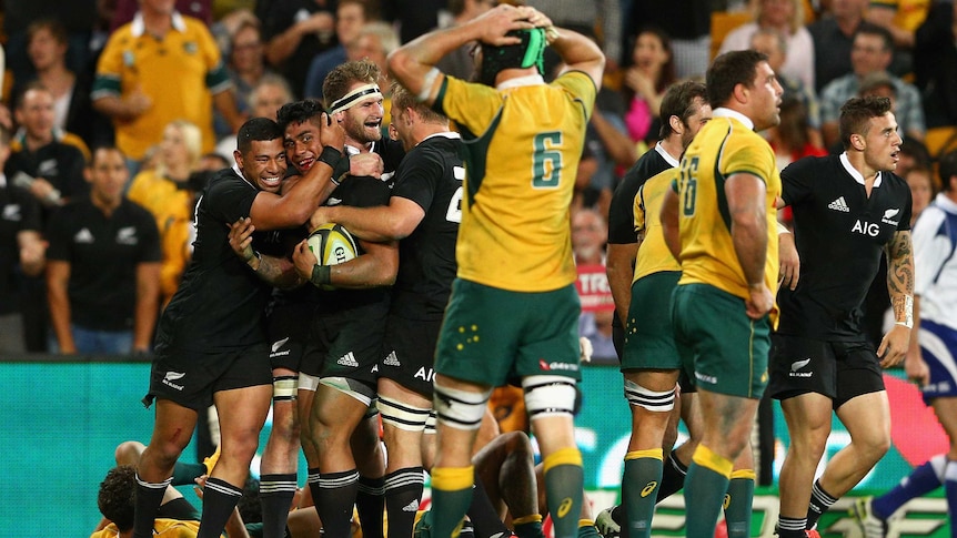 All Blacks sink Wallabies