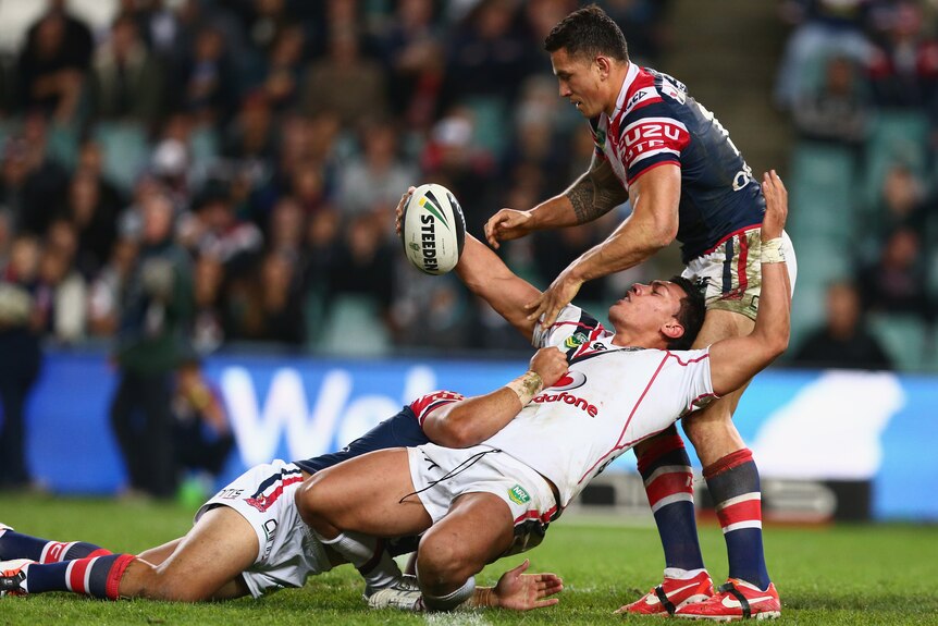 Taylor gets tackled by Sonny Bill