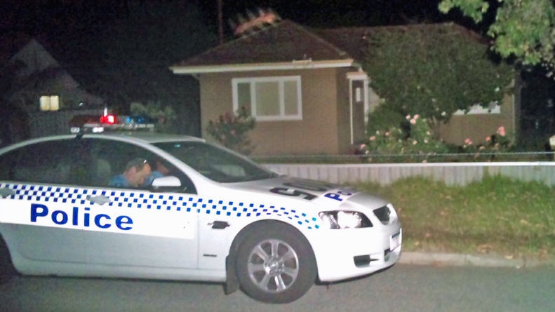 Police outside the woman's house
