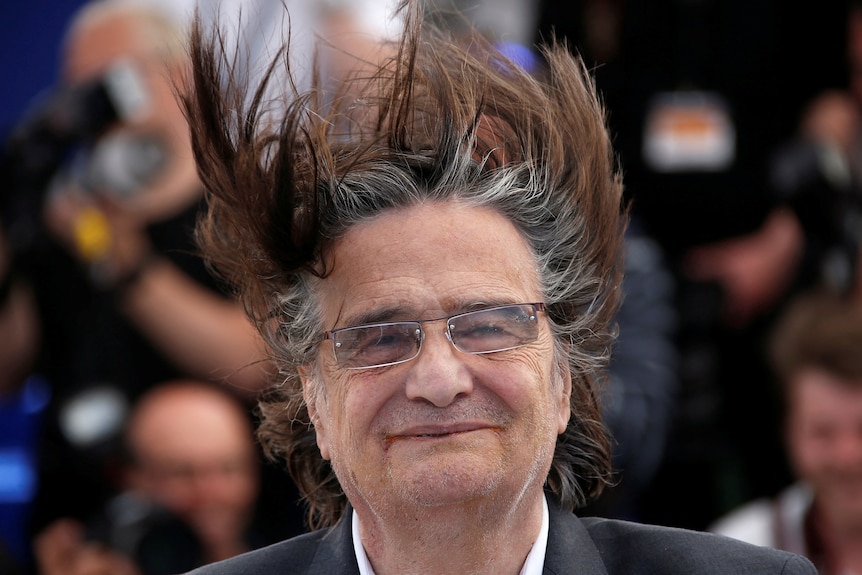 A man with his hair sticking up. 