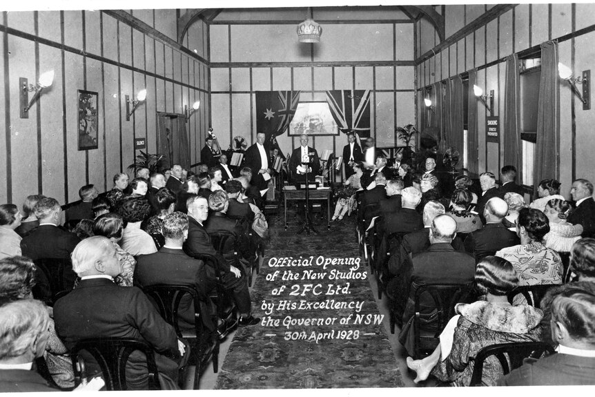 Old black and white photo of the governor of NSW opening the New Studios of 2FC in 1928. 