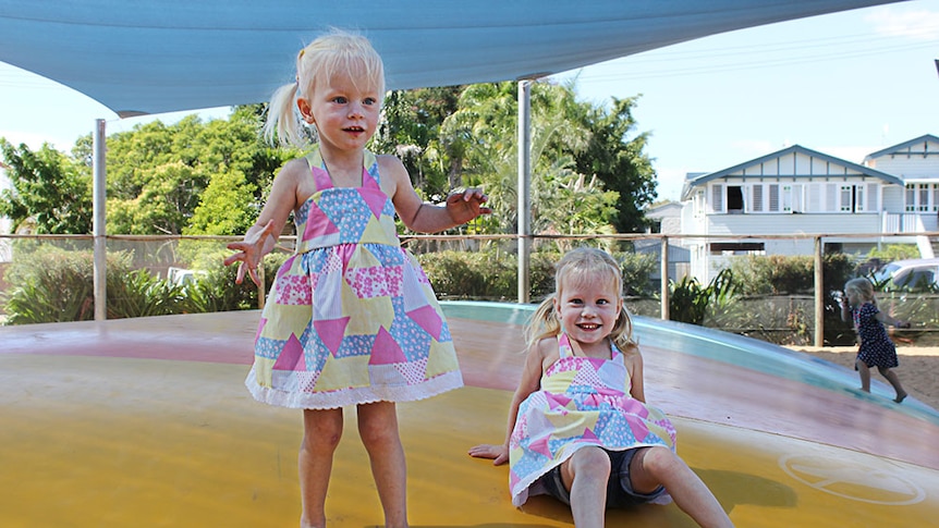 Two little girls in dresses