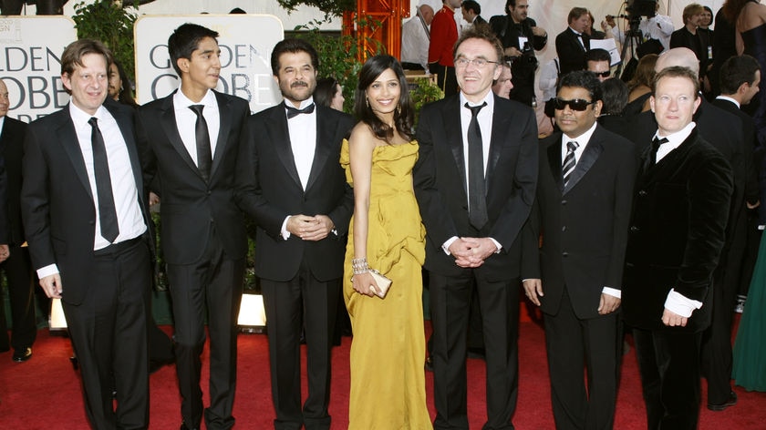 Best film: The cast and crew of Slumdog Millionaire at the Golden Globes.