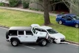 A car rams another vehicle.