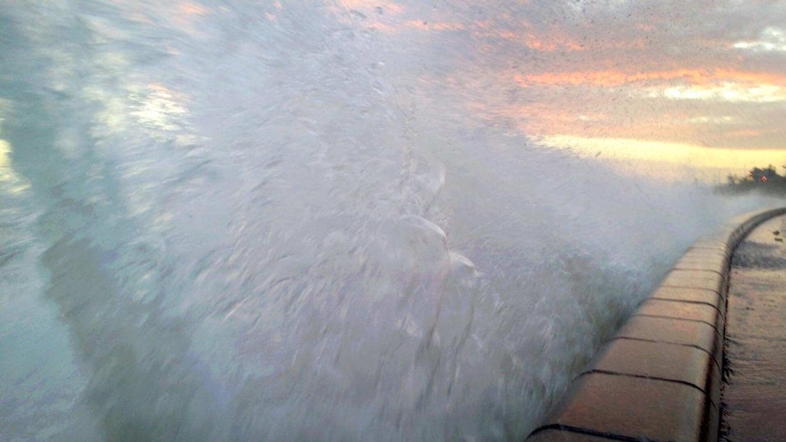 Waves pound Brighton Beach on Port Phillip Bay in Melbourne.