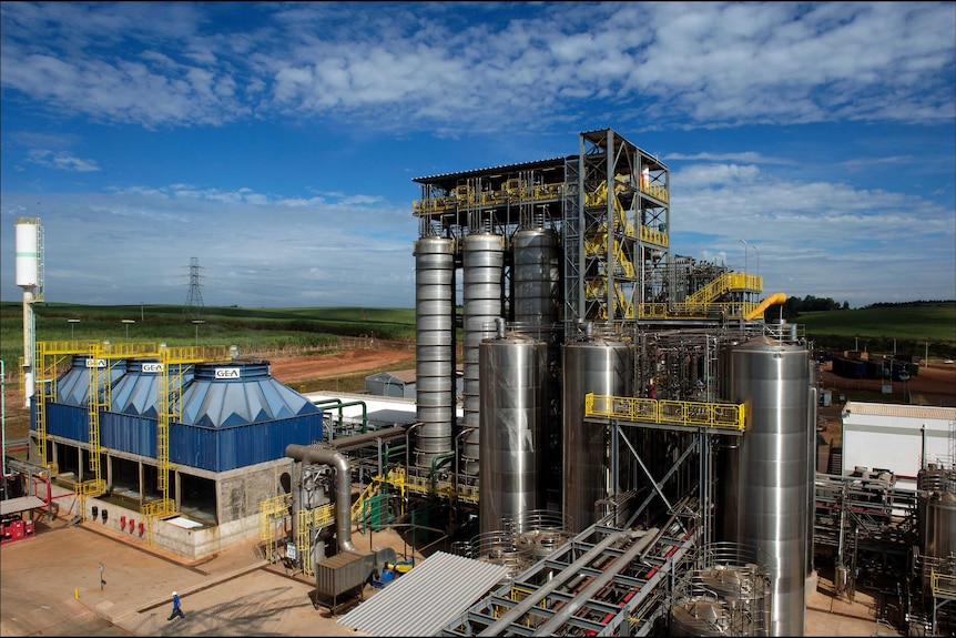 A biorefinery sits among cane fields in brazil.