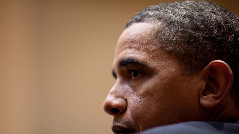 President Barack Obama listens during a meeting in the Roosevelt Room of the White House