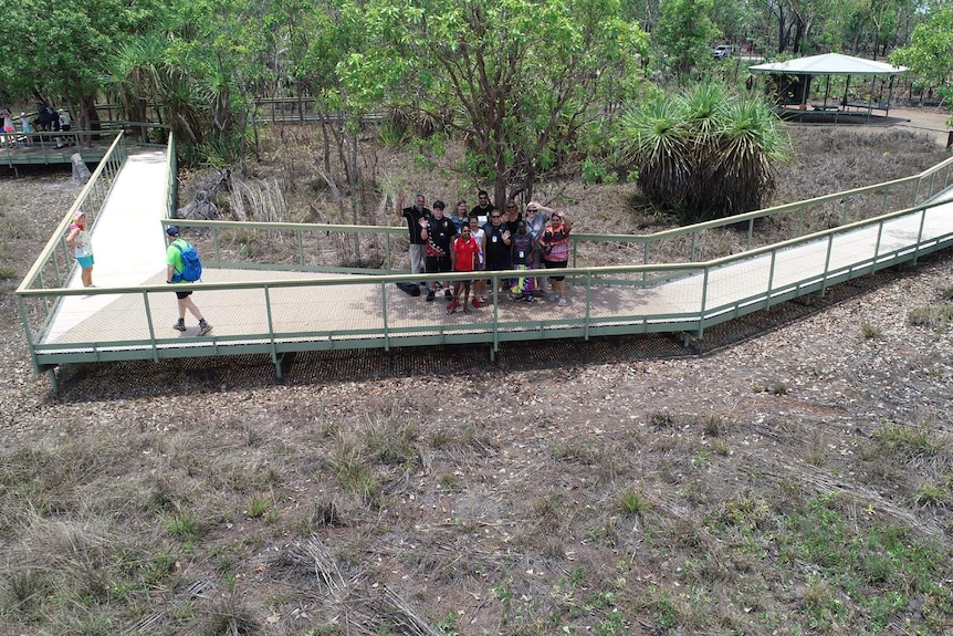 A group shot of participants at the WANALA language forum, taken from a drone above Litchfield National Park.