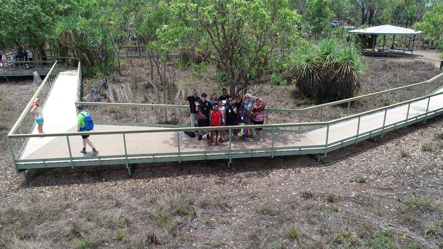 A group shot of participants at the WANALA language forum, taken from a drone above Litchfield National Park.