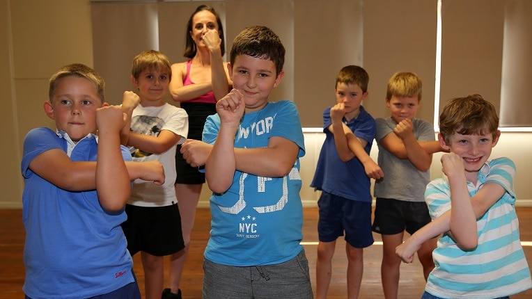 Tom, in middle, with the all boys class at St George.