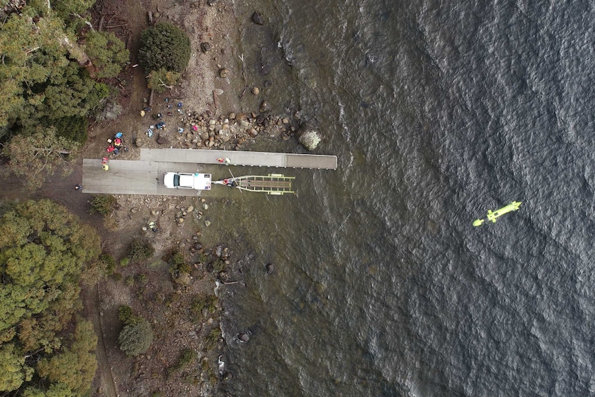 Scientists watch on as the AUV is deployed