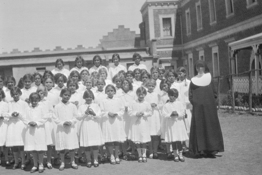 A group if girls and a nun in New Norcia